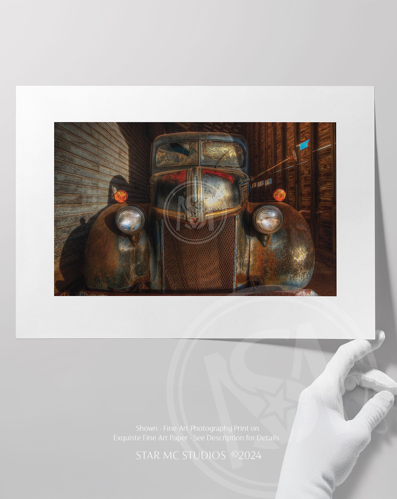 Vintage 1941 Ford F-100 truck illuminated by golden twilight inside an old corn shed, captured in limited edition Southern fine art photography.