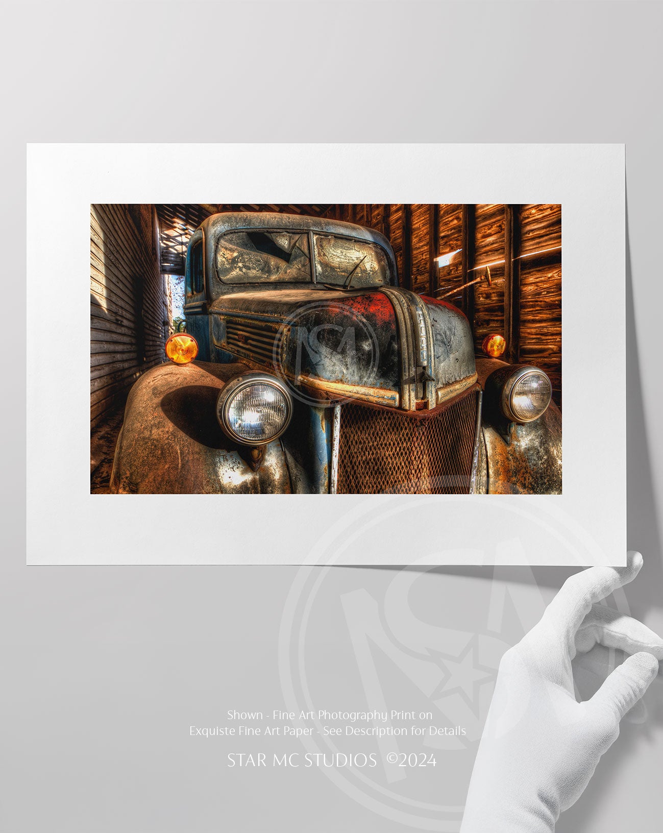 Close-up of a weathered 1941 Ford F-100 truck at dusk inside a corn shed, captured in limited edition Southern fine art photography—nostalgic and reflective.
